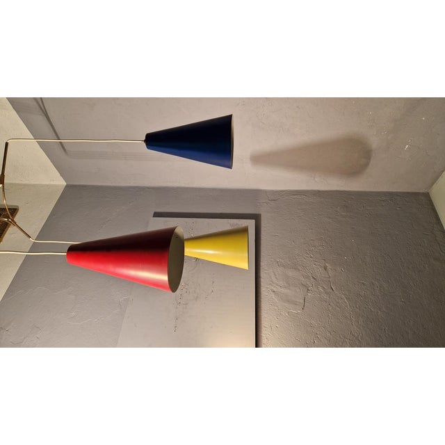 Chandelier in Three-Colored Three-Color Cones from Stilnovo, in Very Good conditions. Designed 1950 to 1959 I have...