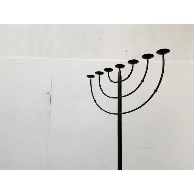 Large brutalist Candle Holder. Handmade from wrought Iron. 7 arms and tripod foot.