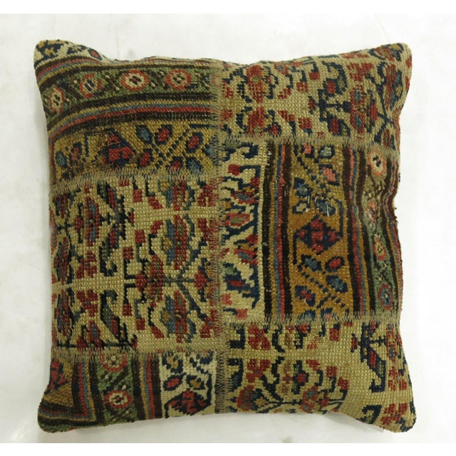 Pillow made into a patchwork format from a Kurdish Tribal rug. 17'' x 18'''