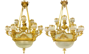 Pair of Louis XVI Style Bronze Chandeliers.