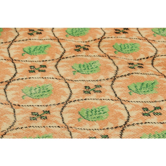 Hand-knotted in wool and originating from Turkey circa 1960 – 1970, this 4x6 vintage Zeki Müren runner is a unique...