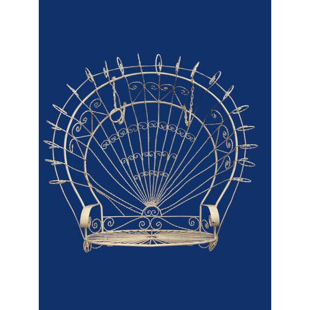 Beautiful vintage Saltarine peacock swing. The chair is in overall great condition. Wear is consistent to age. Seating...