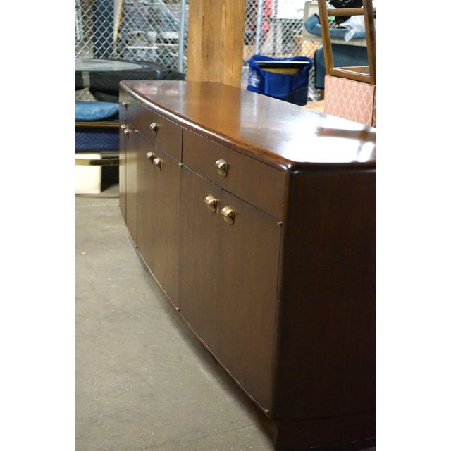 A stunning buffet attributed to Dunbar Furniture and designed by Edward Wormley. The piece is identical to the Wormley...