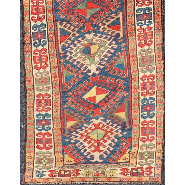 Measures: 3'8 x 10'2 Antique Caucasian Kazak Runner Featuring Intricate Medallion Patterns3'8 x 10'2. Keivan Woven Arts/...
