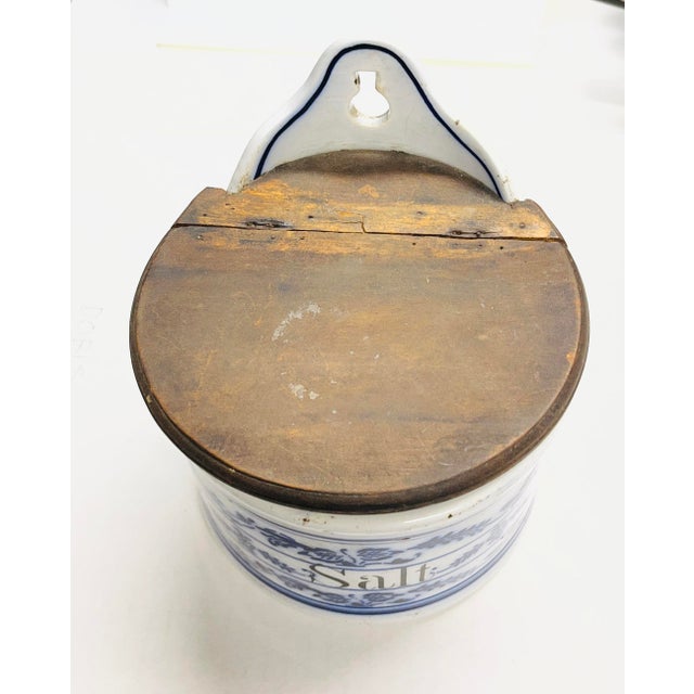 Antique German salt box (cellar). Blue and white ceramic with wood lid. Great shelf appeal. Marked on bottom. Hole for...