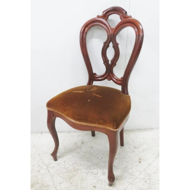Victorian solid mahogany hand carved side chair, dark gold velvet seat. Seat height 18"