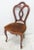 Victorian solid mahogany hand carved side chair, dark gold velvet seat. Seat height 18"