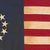 This vintage Betsy Ross American flag is made from a cotton cloth, with fully sewn stripes and 13 embroidered stars....