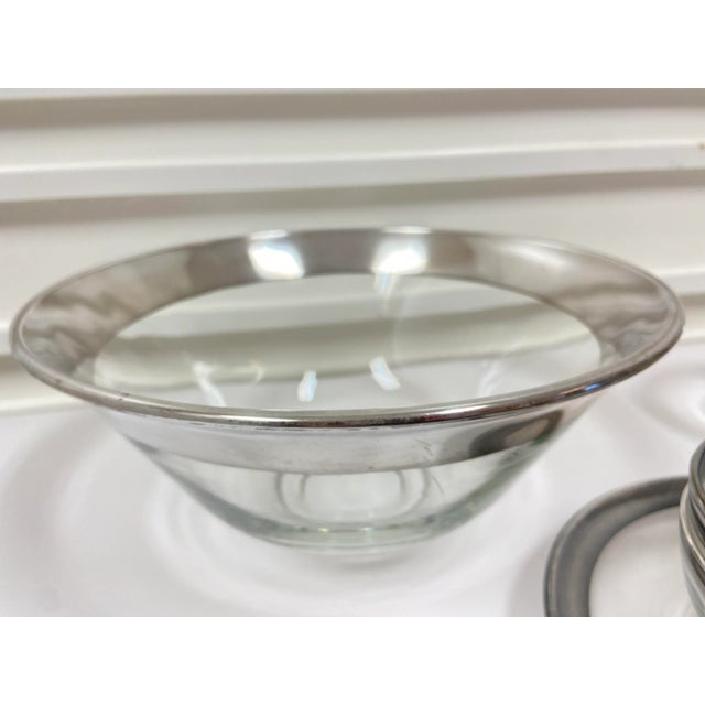 Set of 5 mid century Dorothy Thorpe silver rim bowls and serving dishes. Features a pair of two small bowls, and small...