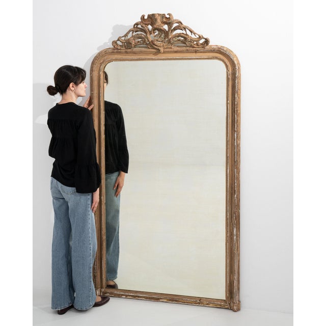 Here is a mirror, its cream/gold carved frame with leaf crest the first thing to catch the eye. Dating to 19th Century and...