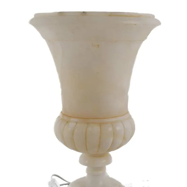 Elegant hand-carved alabaster urn-form lamp from mid-20th-century Italy. The piece features a classical baluster...