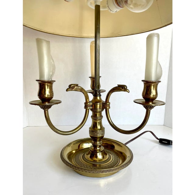 Here is a beautiful French Bouillotte table lamp with brass base and black metal shade. The star of the lamp are the 3...