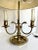 Here is a beautiful French Bouillotte table lamp with brass base and black metal shade. The star of the lamp are the 3...