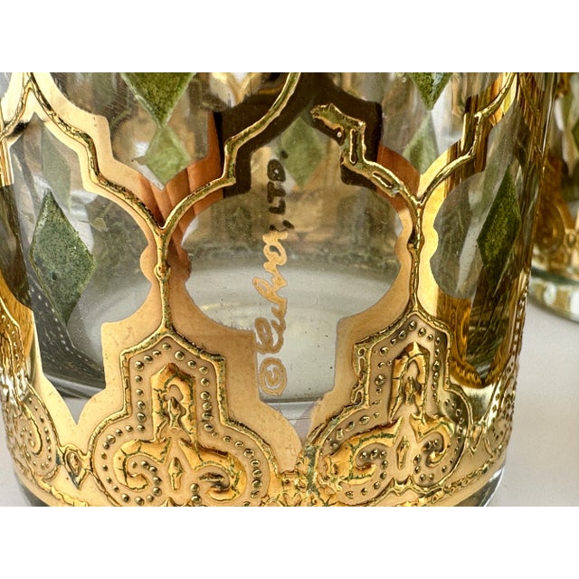 Striking set of rare twelve vintage Culver highball glasses featuring the brand’s signature 22-karat gold overlay in an...