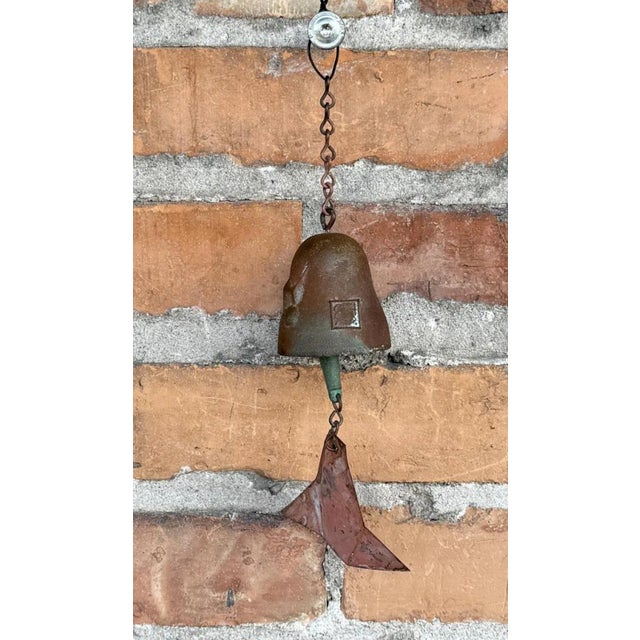 A vintage hand-crafted cast patinated bronze wind bell designed for Arcosanti, an experimental Arizona community by...