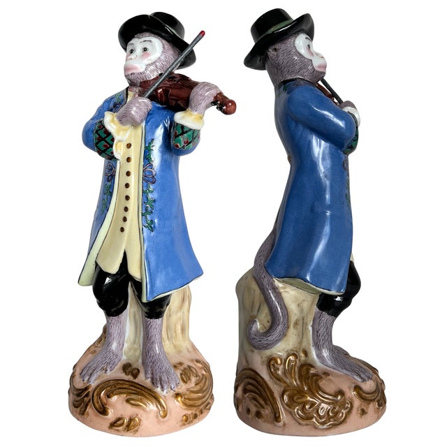 Vintage hand-painted porcelain monkey musician figurine was imported by Andrea by Sadek and is inspired by the celebrated...