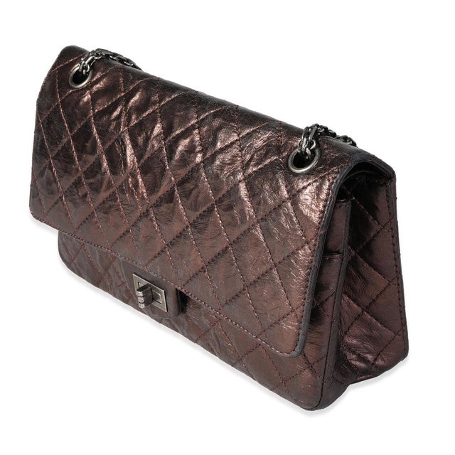 In 2005, Karl Lagerfeld reintroduced the original 2.55 design from Chanel. The quilted flap bag comes in an aged calfskin...