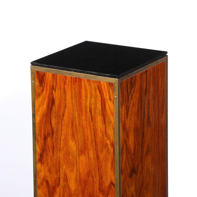 This pair of Art Deco walnut pedestals, crafted in France circa 1935, exemplifies the refined elegance of the period,...