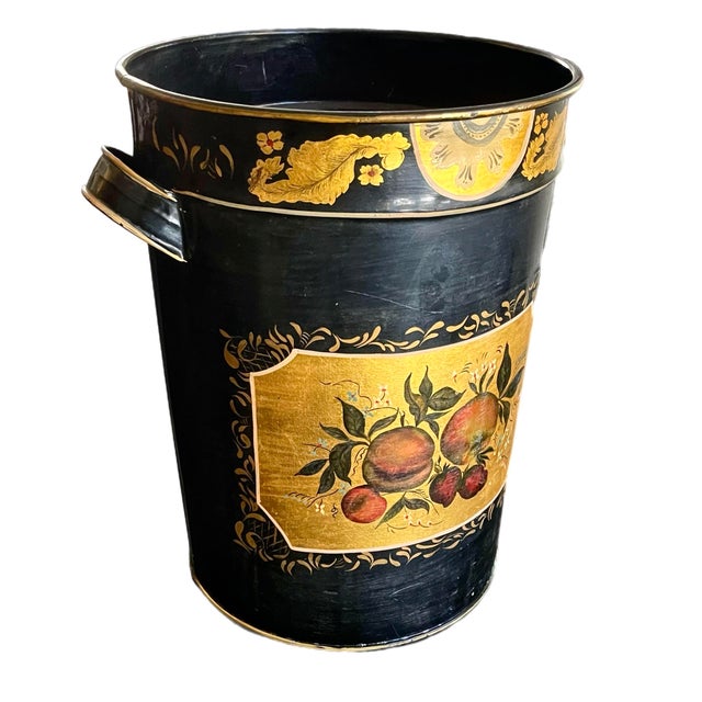 Early 20th century English tole canister with elegant gilt hand stenciled detail and painting with a decoupage central...