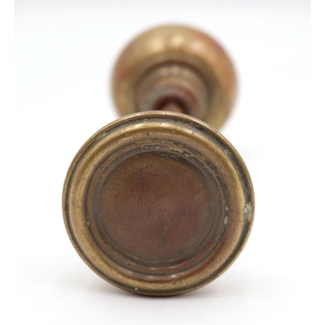 Vintage concentric style passage door knobs made of brass with a patina finish. Good condition with surface wear from...