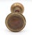 Vintage concentric style passage door knobs made of brass with a patina finish. Good condition with surface wear from...