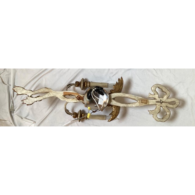 Pair of early 20th century hand carved eagle motif gilt wood wall sconces. Nicely carved and made, will fit in with any...