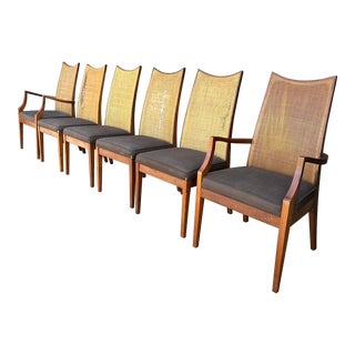 Set of Six John Stuart Walnut and Caned Dining Chairs For Sale