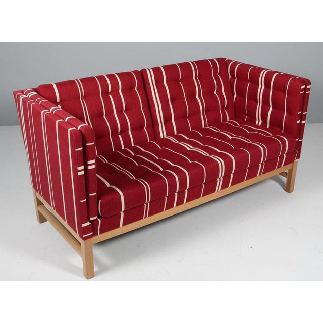 Erik Jørgensen two-seat sofa new upholstered with savak wool. Frame of oak. Model EJ 315/2, made by Erik Jørgensen. This...