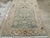 This mid-20th-century Persian Malayer accent rug presents a refined floral and geometric composition across a soft blue...