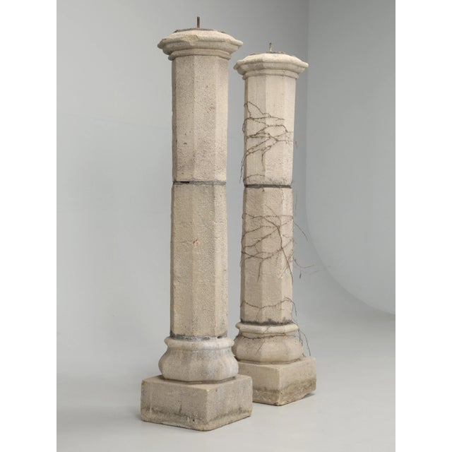 Pair of English stone columns, that are commonly referred to as "composition stone". From what I understand is that the...