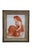 Two antique porcelain framed tiles depicting a young peasant girl resting bare-footed next to a water jug and a young girl...