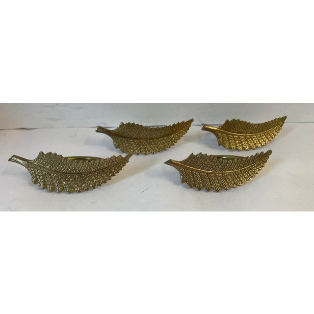 Nice set of four vintage solid brass napkin rings!
