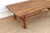 1990s Rustic Warm Elm Stretcher Coffee Table For Sale - Image 5 of 7
