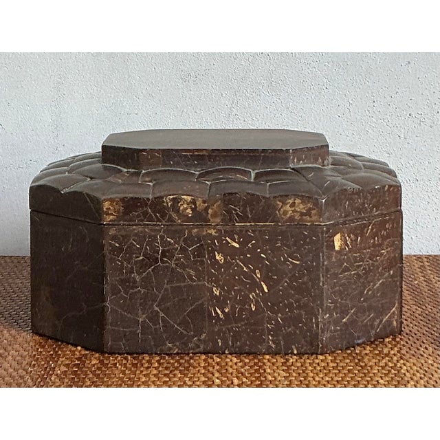 This exquisite vintage trinket box is a testament to natural exotic material craftsmanship, highly sought after in...