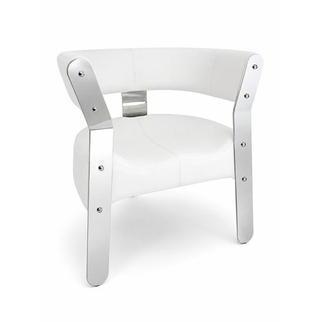 Mecca armchair in leather and stainless steel by christophe perichon. Dimensions: w 65 x d 55 x h 75 cm. Materials:...