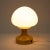 A blown glass table lamp in the Brussels style. Designed in the 1970s, it is an example of the Space Age style, which...