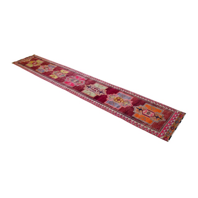 This authentic 1970s vintage runner from Southeastern Anatolia showcases an exceptional gallery-proportion design,...