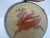 Hand painted and carved dried gourd featuring a carved prancing deer with red scarf. Natural driftwood handle attached to...