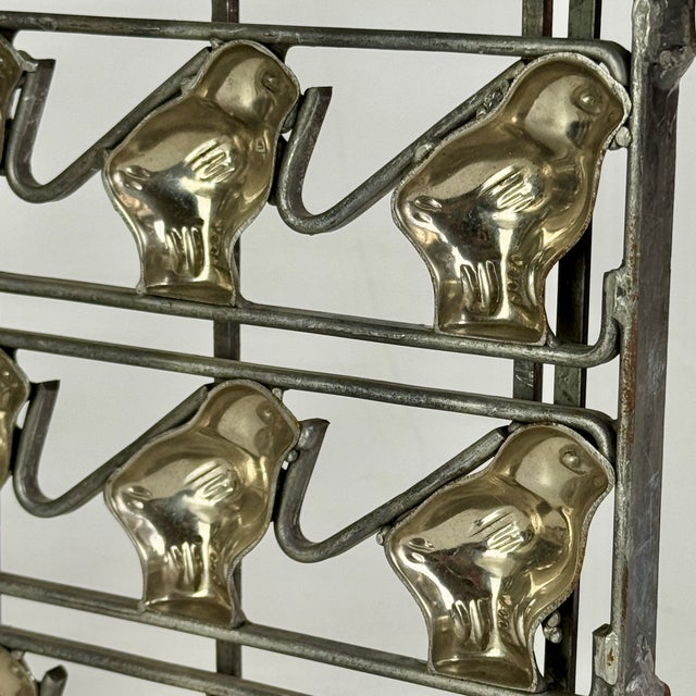 A rare and collectible 19th Century antique 16 count baby chicks metal hinged chocolate mold. Circa: 19th Century...