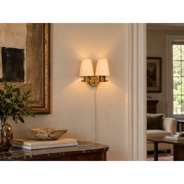 Hans-Agne Jakobsson, Swedish Mid-Century Modern, Double Arm Wall Sconce, Brass, Sweden, 1960s A modernist double-arm wall...