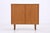 Vintage chest of drawers from WK Möbel with clean proportions and beautiful teak grain. The spacious interior with a shelf...