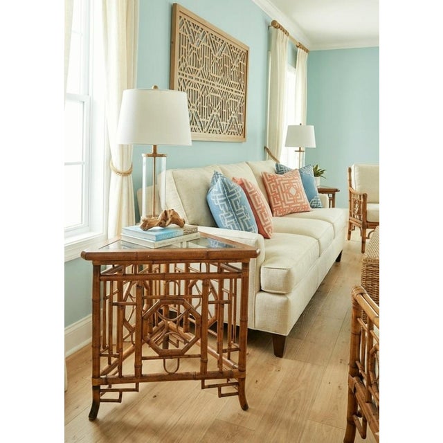 A wonderful and unusual Chinese Chippendale bamboo triangular glass top side table. This is such a unique side table with...