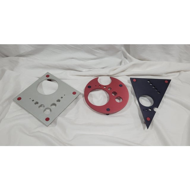 A trio of abstract postmodern trivets. Made of machined Aluminum. This really unique set is one of a kind amd rare. From a...