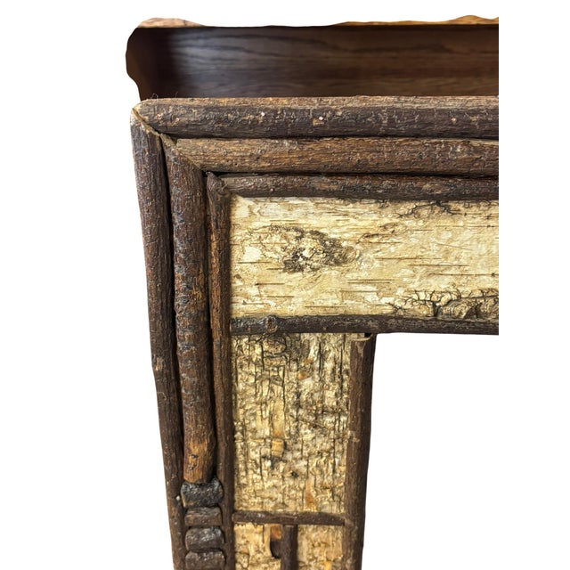 This vintage handcrafted log mirror is unique and ooak. With longer twigs extending to create the frame and tiny hand cut...