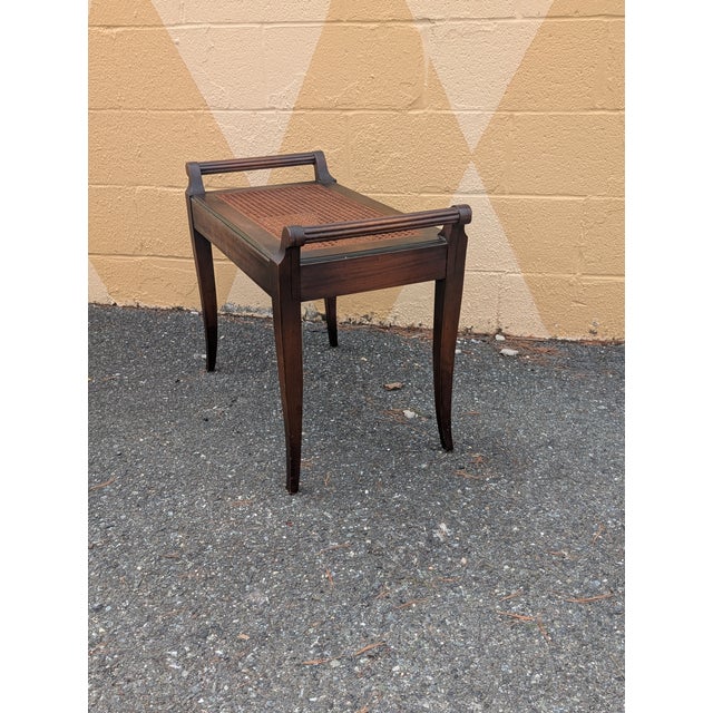 Elevate your interior with this stunning vintage bench, a versatile piece that functions beautifully as a piano seat,...