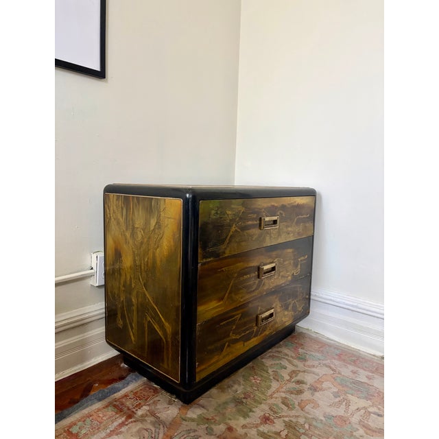 Stunning Mastercraft small chest of drawers. Etched brass with lacquered black accents and three drawers. Great condition....
