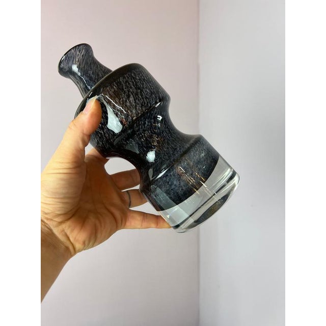 This vase is a fascinating example of Swedish glass art from the mid-century era, designed by Bo Borgström for the...
