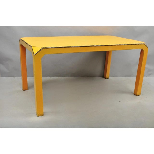 Vintage Hollywood Regency Orange Vinyl & Laminate Parsons Style Dining Table / Desk. Item features a glossy vinyl wrapped...