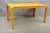 Vintage Hollywood Regency Orange Vinyl & Laminate Parsons Style Dining Table / Desk. Item features a glossy vinyl wrapped...