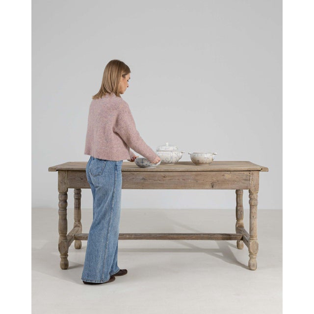 This piece presents as a table, distinguished by natural bleached oak, turned baluster. Originating in France during 19th...